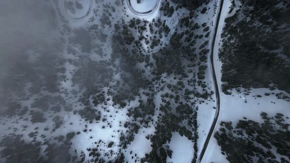 High angle aerial footage of winding road near Crater Lake, Oregon, USA