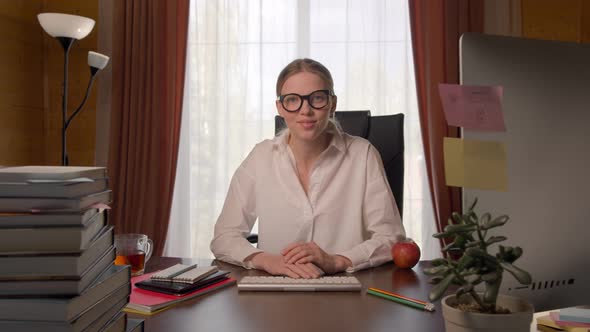 Beautiful Woman at Work Desk, Calls By Video Link, Work Conference, Young Woman at Remote Work