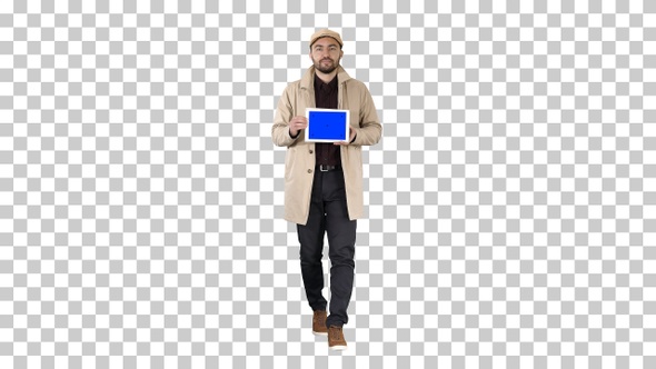 Attractive man holding tablet with blue key screen mockup