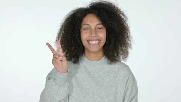 Victory Sign By African Woman, White Background