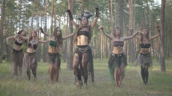 Group of Women Dancers with Make-up and in Mystical Costumes