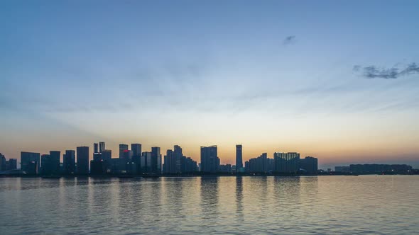 Timelapse of city skyline from day to night in hangzhou china