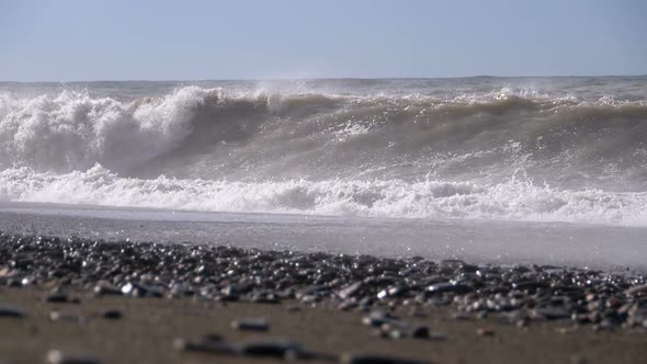 Storm on the Sea. Huge Waves Are Crashing and Spraying on the Beach