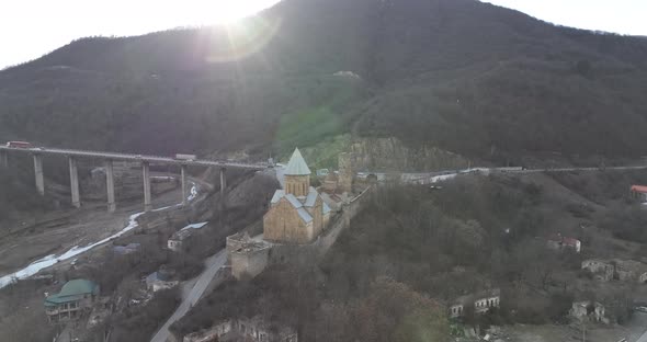 Aerial view of old Ananuri Fortress with two churches and picturesque view on river. Georgia 2022