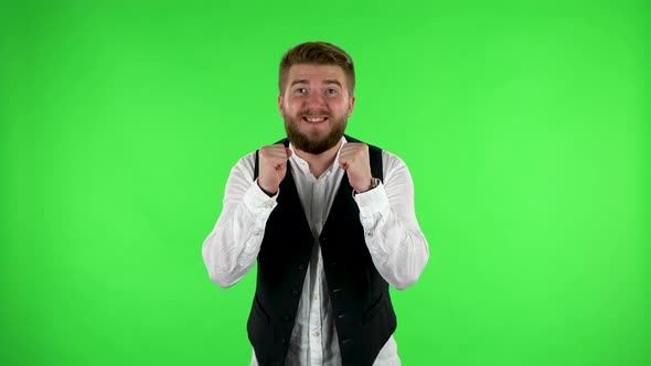 Man Looking at Camera with Anticipation, Then Very Upset. Green Screen