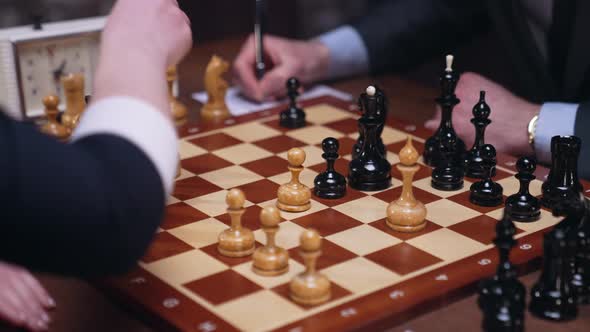Players Play Chess Board