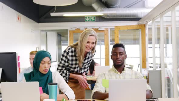 Creatives working in a modern office