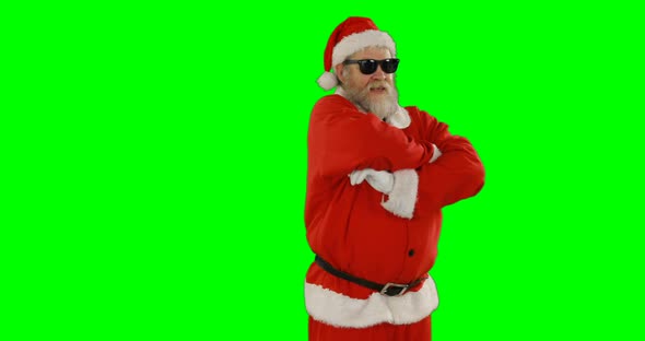 Santa claus posing with sunglasses