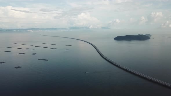 Boat sail at Penang second bridge and fish farm.