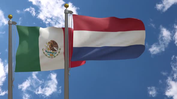Mexico Flag Vs Netherlands Flag On Flagpole