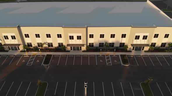 Aerial of newly constructed modern offices, light industrial, business facilities designed with whit