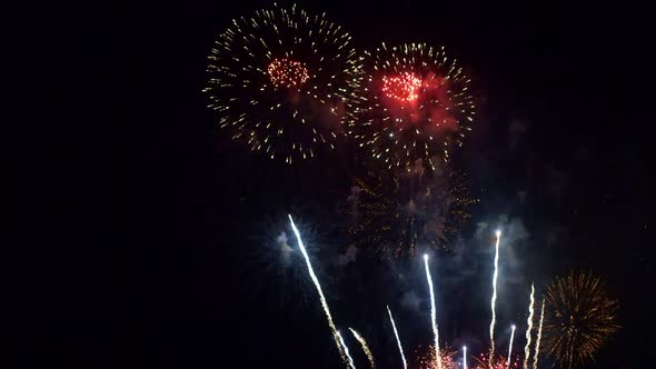 Colorful Firework display at night on sky background