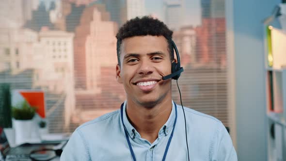 Close-up Shot of Mixed-race Customer Service Operator Talking To Client in Call Center