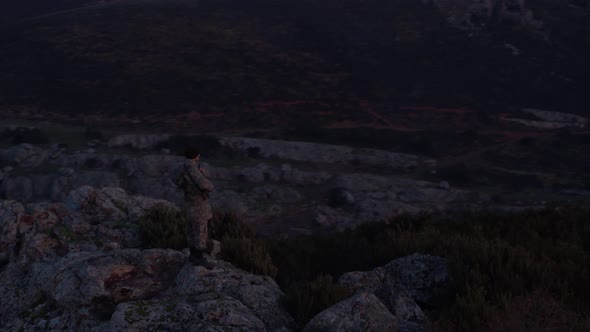 Soldier In The Morning Holds Guard With His Rifle