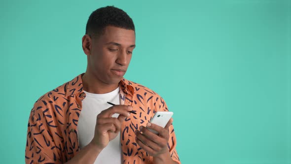 Creative African American Man Working on Phone