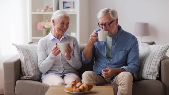 Happy Senior Couple Drinking Coffee at Home 26