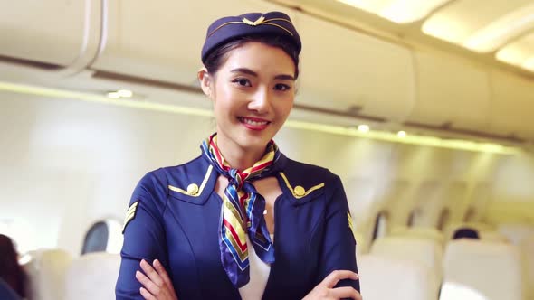 Cabin Crew or Air Hostess Working in Airplane
