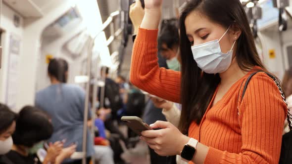 Young asian woman cover mouth , wear medical face mask to protect viruses