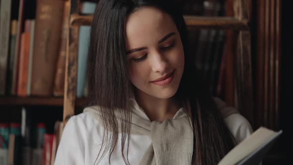 Close Up of Girl Reading Book