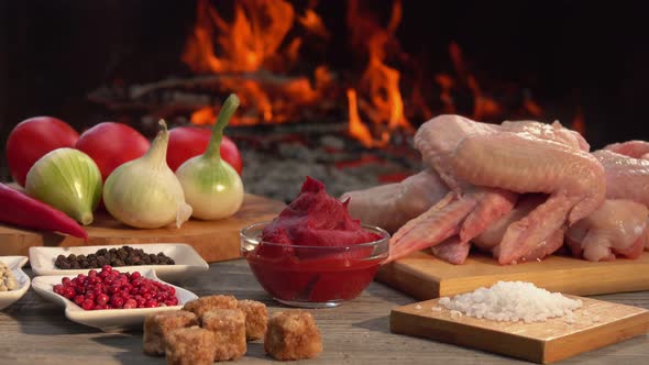 Wooden Surface with the Ingredients for the Preparation of Grilled Chicken Wings