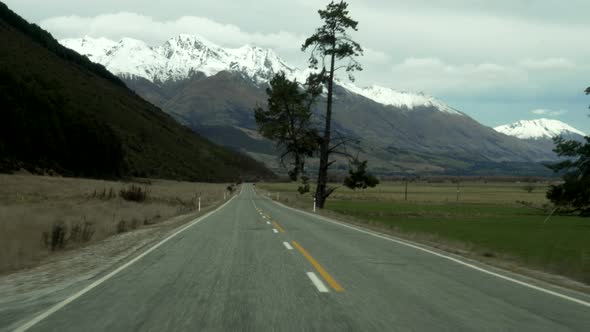 A first person view of driving through the beautiful country of New Zealand