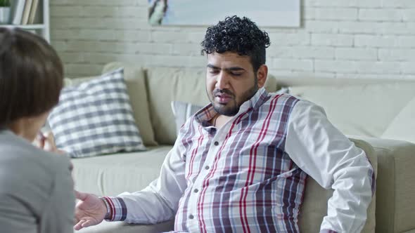 Arab Man on Psychotherapist Appointment