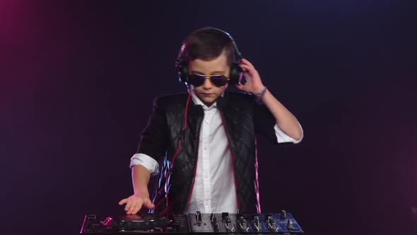 Cool Boy Dj with Glasses Playing on Turntable, Slow Motion