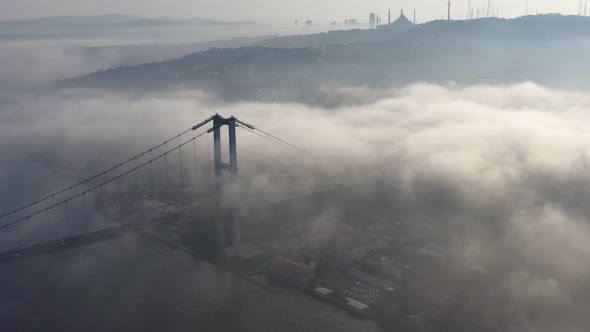 aerial video of bosphorus Bridge on a foggy day in Istanbul, Turkey, Martyrs Bridge 