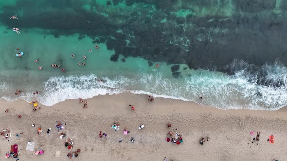 People swim in the sea aerial view 4 K Turkey Alanya