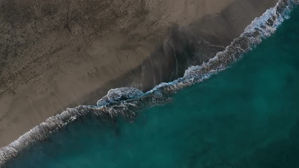 Top View of the Desert Black Beach on the Atlantic Ocean. Coast of the Island of Tenerife. Aerial