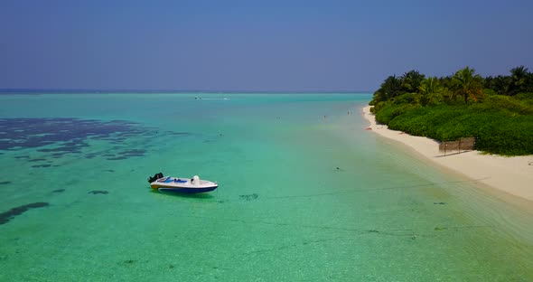 Wide fly over abstract view of a sunshine white sandy paradise beach and aqua blue water background 