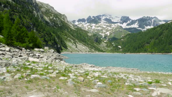 Mountain Landscape with Clouds and Lake at Alpe Devero in Devero Valley Piemonte Italy