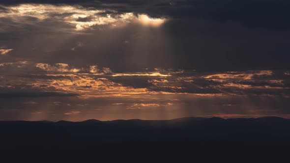 Glorious Sun Rays Through Clouds Zoom Out