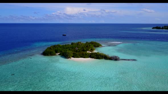 Aerial top view seascape of luxury lagoon beach holiday by clear sea with white sand background of j