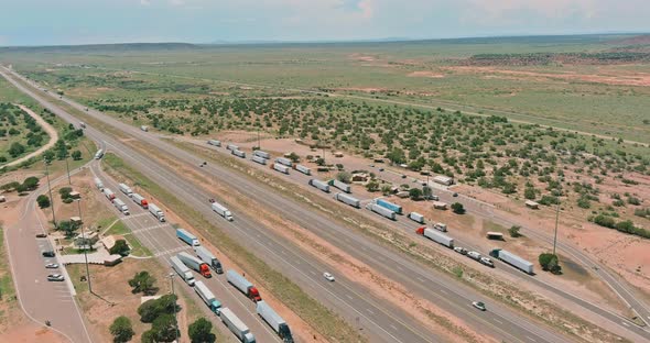 Aerial Horizontal Panorama View of Truck Stop on the Highway Car Parking Lot Endless Interstate