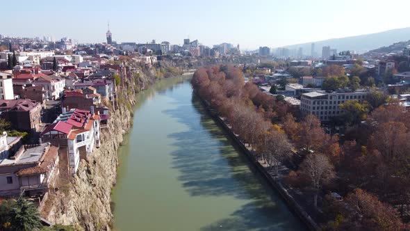 Late Autumn Cityscape By The River