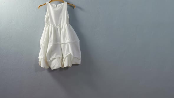 Dress hanging on hook 4k