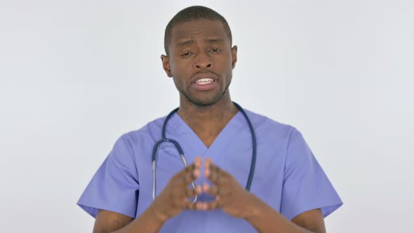 African Doctor Talking on Online Video Call on White Background