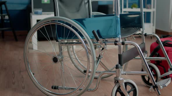 Close Up of Wheelchair in Nursing Home Room for Assistance
