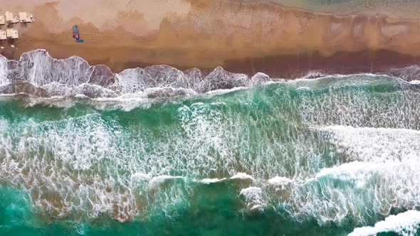 Aerial View of the Sea Sandy Beach Sun Umbrellas and Sunbeds Unrecognizable People