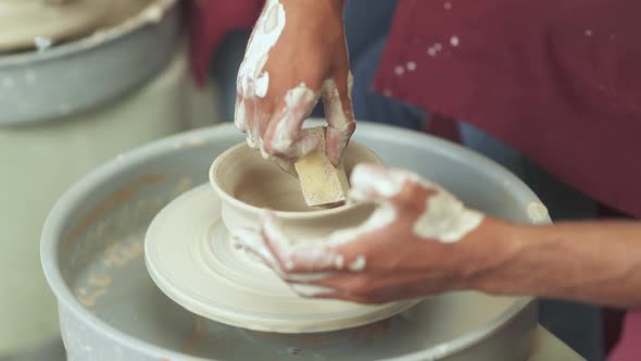 Clay Tableware Production the Potter Makes a Pitcher Out of Clay Closeup View of the Hands