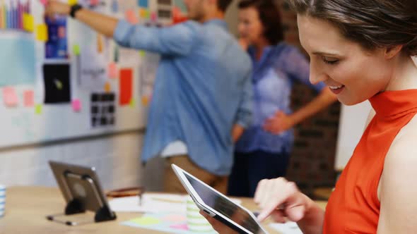 Businesswoman using digital tablet