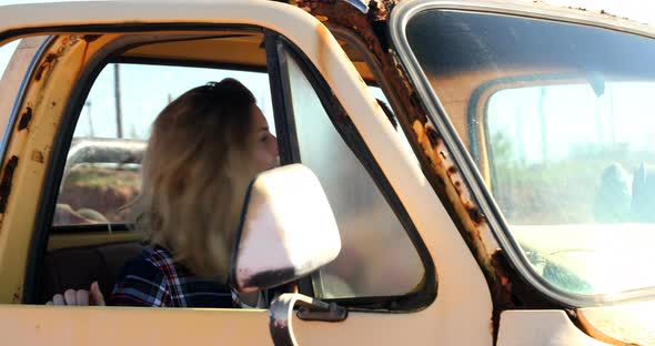 Woman getting down from the car