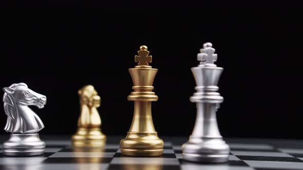 Golden King chess is last standing in the chess board, Game of Chess. Leader and Teamwork Concept fo