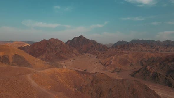 Drone shot of desert mountains and dunes of Southern Israel.Red Mountains, Red Sea.