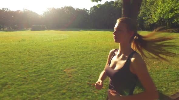 Runner Woman Running In Park Exercising Outdoors 3