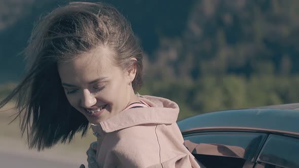 Pretty Happy Smiling Lady Gets Pleasure From Speeding Car