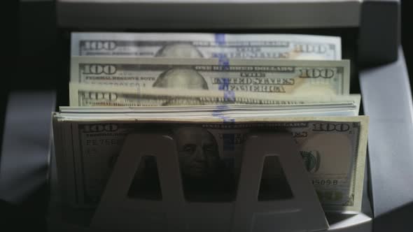 Slow Motion Shot of Money Counting Machine for Paper Money