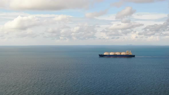 Liquefied natural gas tank in the open ocean. Transportation of liquefied gas and oil products. LNG