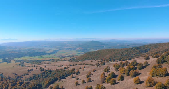 Panorama Of Hills And Mountains With Abundant Autumnal Forest Trees